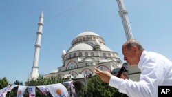 İstanbul'da bir seçim mitinginde konuşan Cumhurbaşkanı Recep Tayyip Erdoğan